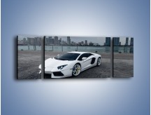 Obraz na płótnie – Lamborghini Aventador na tle miasta – trzyczęściowy TM197W5