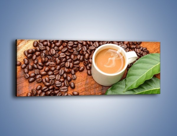 Obraz na płótnie – Ziarna kawy pod liściem – jednoczęściowy panoramiczny JN417
