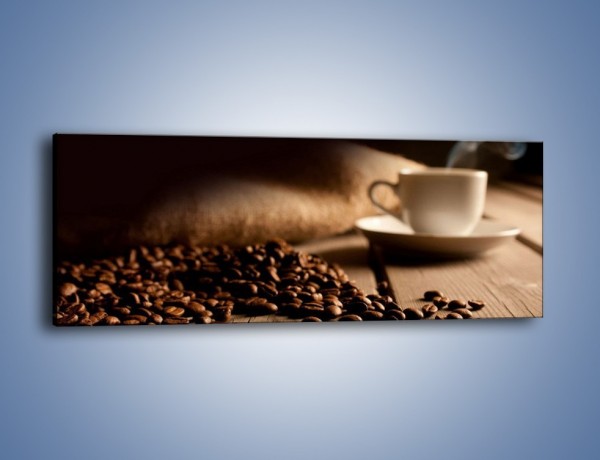 Obraz na płótnie – Ziarna kawy na drewnianym stole – jednoczęściowy panoramiczny JN457