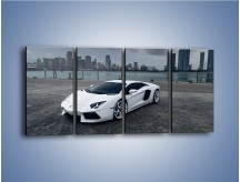 Obraz na płótnie – Lamborghini Aventador na tle miasta – czteroczęściowy TM197W1