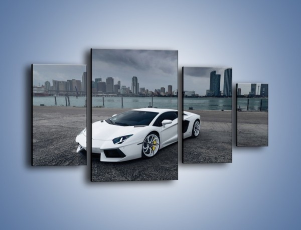 Obraz na płótnie – Lamborghini Aventador na tle miasta – czteroczęściowy TM197W4