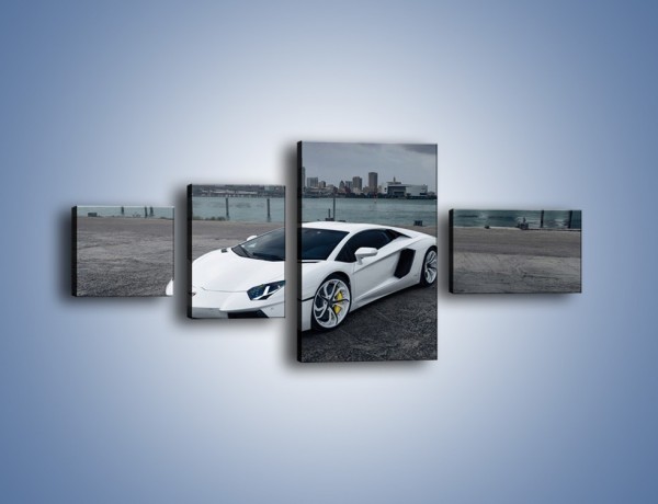 Obraz na płótnie – Lamborghini Aventador na tle miasta – czteroczęściowy TM197W5
