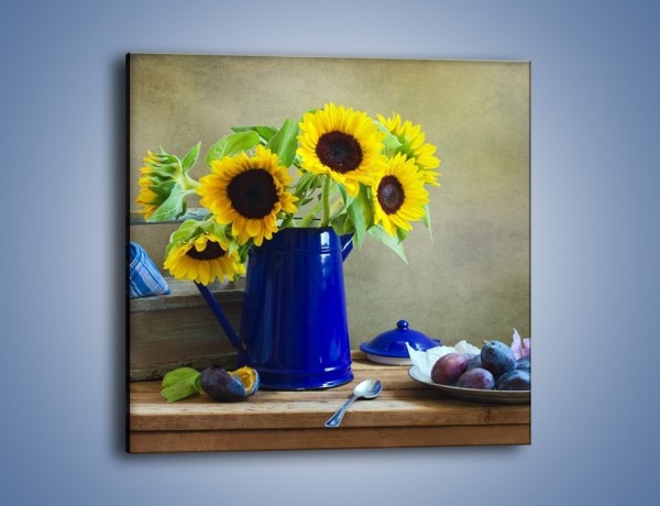Obraz na płótnie – Słoneczniki w niebieskiej konewce – jednoczęściowy kwadratowy K420