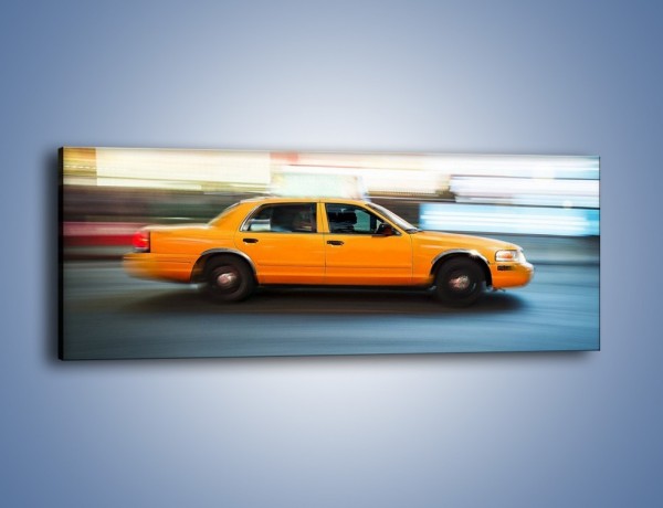 Obraz na płótnie – Żółta taksówka w ruchu – jednoczęściowy panoramiczny TM221