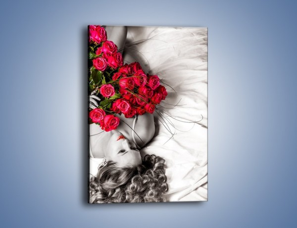 Obraz na płótnie – Kobieta z bukietem róż – jednoczęściowy prostokątny pionowy L381
