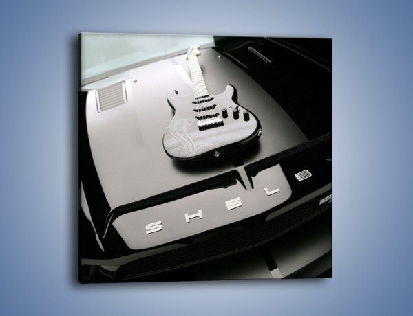 Obraz na płótnie – Gitara na masce Ford Shelby – jednoczęściowy kwadratowy TM056