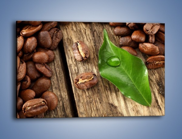 Obraz na płótnie – Ziarna kawy obok liścia – jednoczęściowy prostokątny poziomy JN382
