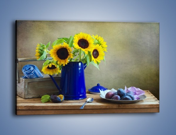 Obraz na płótnie – Słoneczniki w niebieskiej konewce – jednoczęściowy prostokątny poziomy K420