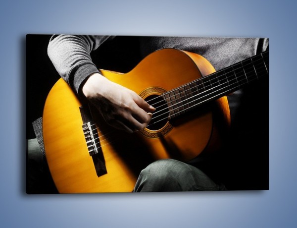 Obraz na płótnie – Chłopiec z gitarą – jednoczęściowy prostokątny poziomy O109