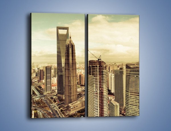 Obraz na płótnie – Panorama miasta w ciągu dnia – dwuczęściowy prostokątny pionowy AM128