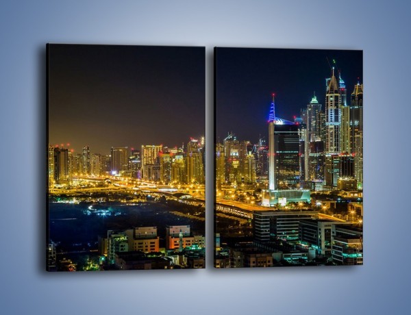 Obraz na płótnie – Oświetlony Dubaj nocą – dwuczęściowy prostokątny pionowy AM506