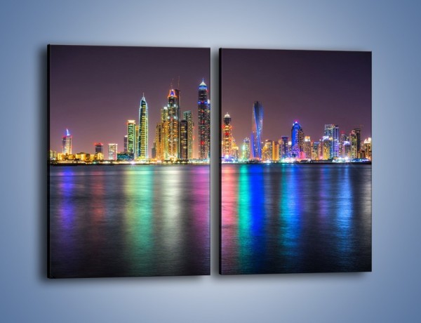 Obraz na płótnie – Kolorowe drapacze chmur w Dubaju – dwuczęściowy prostokątny pionowy AM724