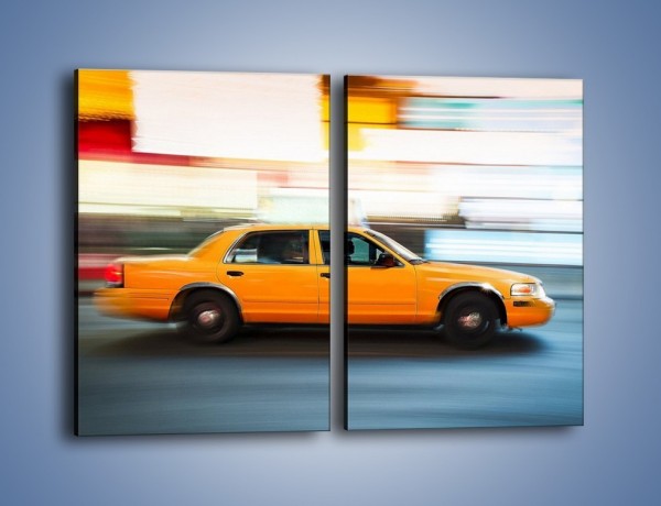 Obraz na płótnie – Żółta taksówka w ruchu – dwuczęściowy prostokątny pionowy TM221