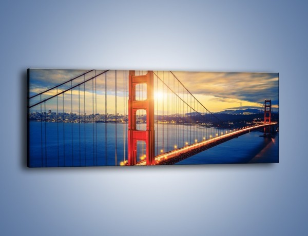 Obraz na płótnie – Zachód słońca nad Mostem Golden Gate – jednoczęściowy panoramiczny AM738