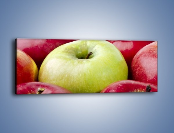 Obraz na płótnie – Zielone wśród czerwonych jabłek – jednoczęściowy panoramiczny JN155